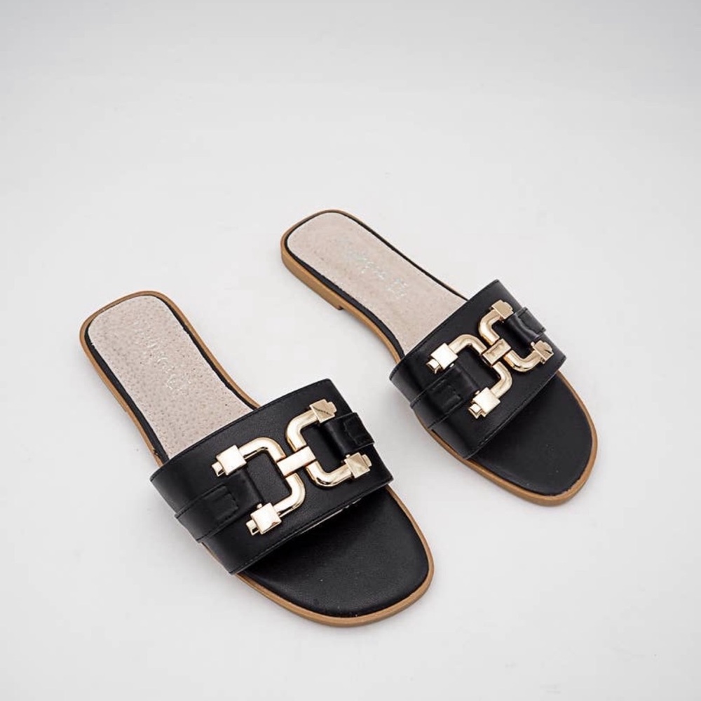Chic Sandals chic flat mules with gold accessories